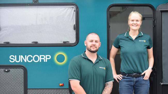 Customer Support Manager Joel Ridding and Suncorp’s Chief Executive Consumer Insurance Lisa Harrison with one of their mobile hubs.