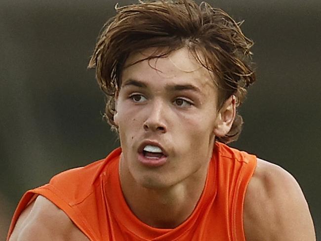 MELBOURNE, AUSTRALIA - MARCH 26: Aaron Cadman of the GWS Giants handballs during the round one VFL match between Essendon Bombers and Greater Western Sydney Giants at The Hangar on March 26, 2023 in Melbourne, Australia. (Photo by Daniel Pockett/AFL Photos/via Getty Images)