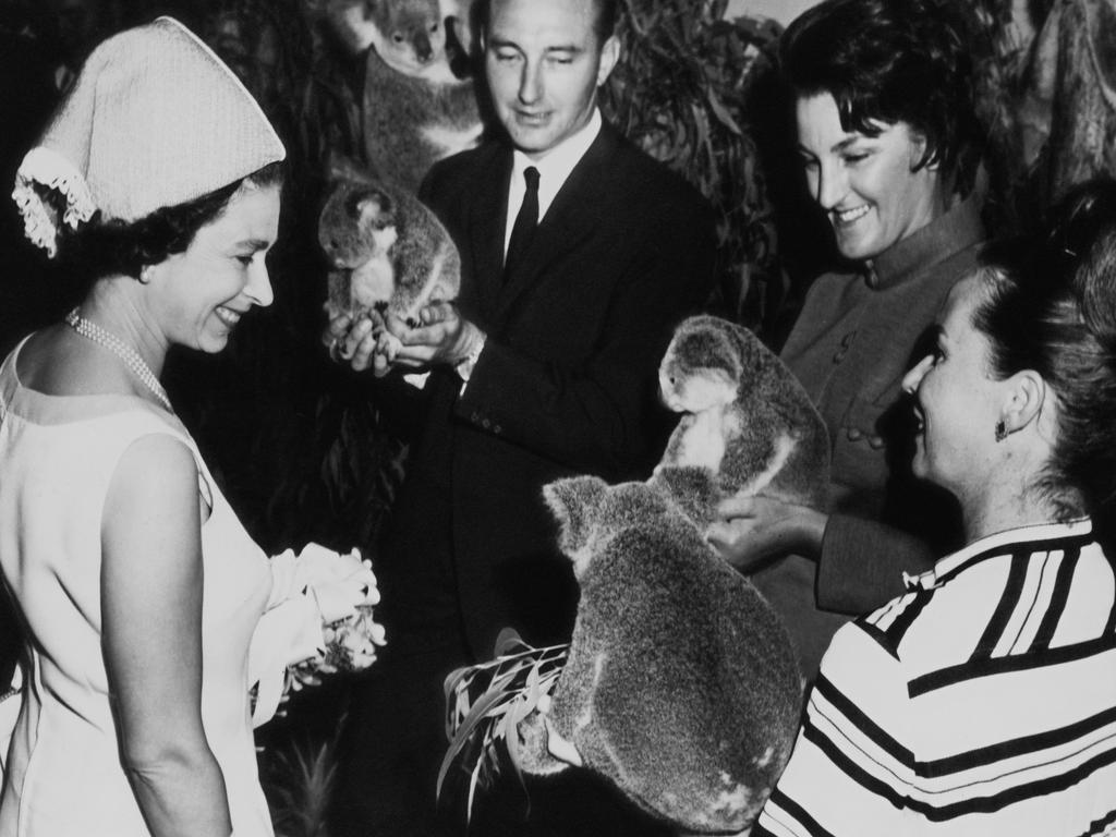 <b>1970 – Brisbane</b> The 1970 tour, which took in the ACT, NSW, Victoria, Queensland and Tasmania, was organised in connection with the bicentenary of Captain James Cook sailing up the east coast of Australia in 1770, but there was time for typical tourist pursuits – including meeting koalas in Brisbane. Picture: Fox Photos/Hulton Archive/Getty