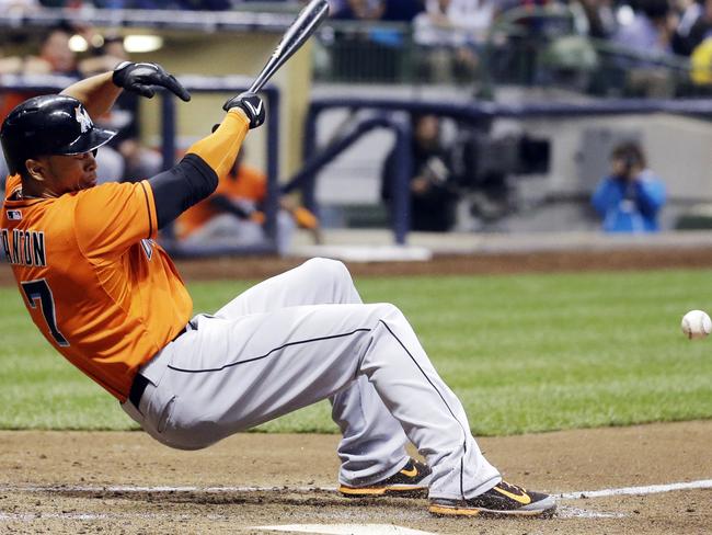 Stanton falls back after he was hit by the pitch.