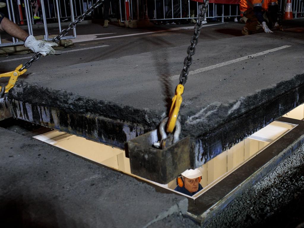 Mike Parr art installation for Dark Mofo: He his buried under Macquarie St Hobart. Picture: DARK MOFO