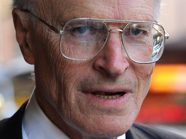 Former High Court judge Dyson Heydon, commissioner for the Royal Commission into Trade Union Governance and Corruption leaves at the Royal Commission offices in Sydney, Friday, Aug. 14, 2015. Mr Heydon was due to be the guest speaker at a Liberal Party fundraiser on August 26. (AAP Image/Joel Carrett) NO ARCHIVING