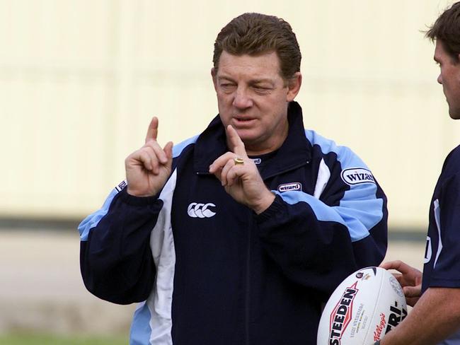 MAY 23, 2004 : Matthew (Matt) Gidley (R) listens as coach Phil Gould speaks during NSW State of Origin team training session at Wentworth Park in Sydney, 23/05/04. Pic Chris Hyde.Rugby League