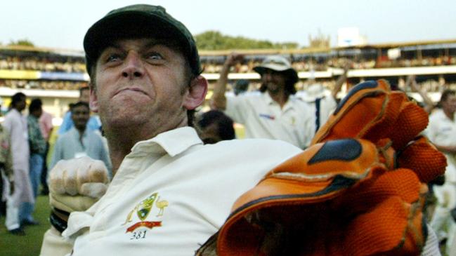 29/10/2004: Australia's Adam Gilchrist celebrates his team's victory over India in the third cricket test match in Nagpur.