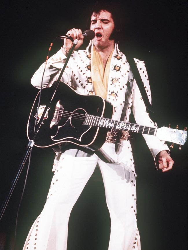 Singer Elvis Presley performing in concert in 1973.