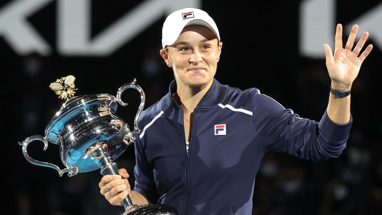 Barty holds the winners trophy after winning the women's final. Picture: David Caird