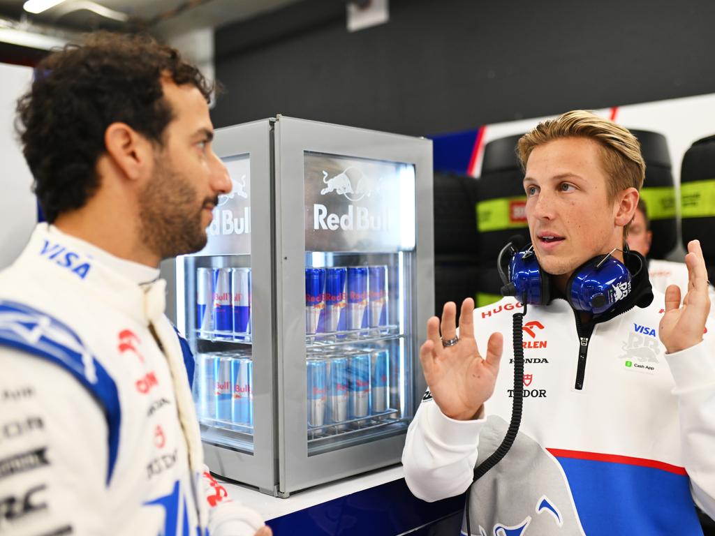 Liam Lawson (R) of New Zealand and talks with Daniel Ricciardo. Picture: AFP