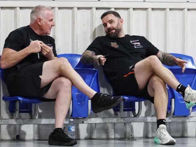 Cairns Taipans chief executive Mark Beecroft speaks with head coach Adam Forde at a training session. Picture: Brendan Radke