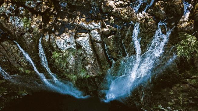 Aerial overlooking Minyon Falls in Nightcap National Park, Whian Whian.