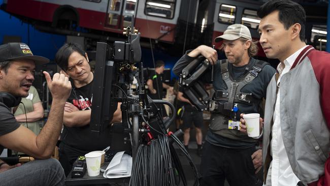 Director Destin Daniel Cretton, fight instructor Alan Tang, crew camera operator, and Simu Liu on the Sydney set of Shang-Chi and the Legend of the Ten Rings. Picture: Jasin Boland.