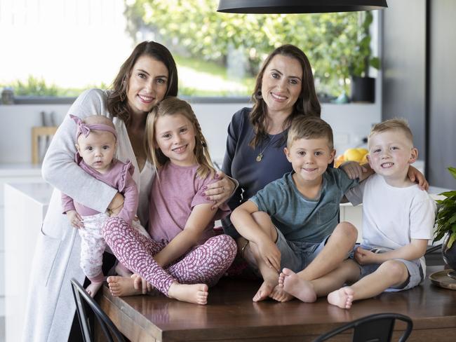 Natalie Gray, back left, and her children, Tilly, 5 months, and Harvey, right, and Natalie Gray and her children Savannah, 7, and Spencer, 5. Picture: Eddie Safarik