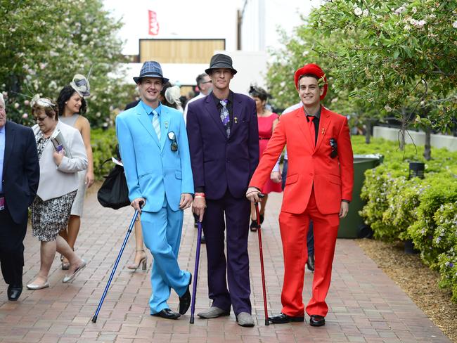 Juddy Layton, Kerren Layton and Sebastian Parkitny all dressed up at Flemington Racecourse on Melbourne Cup Day 2014. Picture: Stephen Harman