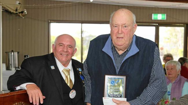 Lions president Con Lo Giudice presented Graham Buchner with the Lion Citizen award and a $500 donation for Cancer Council at the Lions Club lunch last year. Picture: John Towells