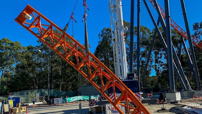 The final piece of Dreamworld's newest rollercoaster the Steel Taipan is in place. Picture: Supplied.