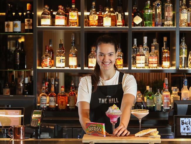 Bar tender Tatiana Krslovic at Made By The Hill, another recent addition to the precinct. Picture: Carmela Roche