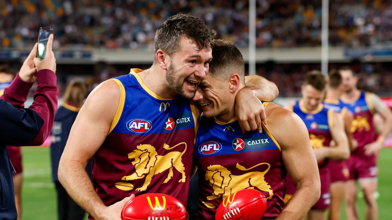 Zorko celebrates the Lions’ preliminary final win with teammate Conor McKenna. Picture: Dylan Burns/AFL Photos via Getty Images