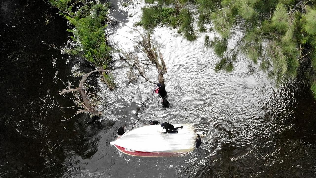 The upturned dingy from the Australia Day tragedy. Picture: Toby Zerna