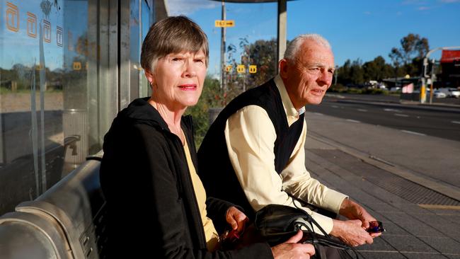 Lynne and John Carruthers wait at the Merriville Rd bus stop in Kellyville Ridge. Picture: Angelo Velardo