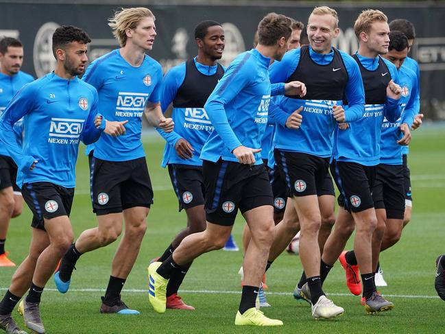 Players are seen warming up during a Melbourne City training session at the City Football Academy in Bundoora, Wednesday, May 1, 2019. Melbourne City will take on Adelaide United in the A-League elimination final on Sunday. (AAP Image/Stefan Postles) NO ARCHIVING