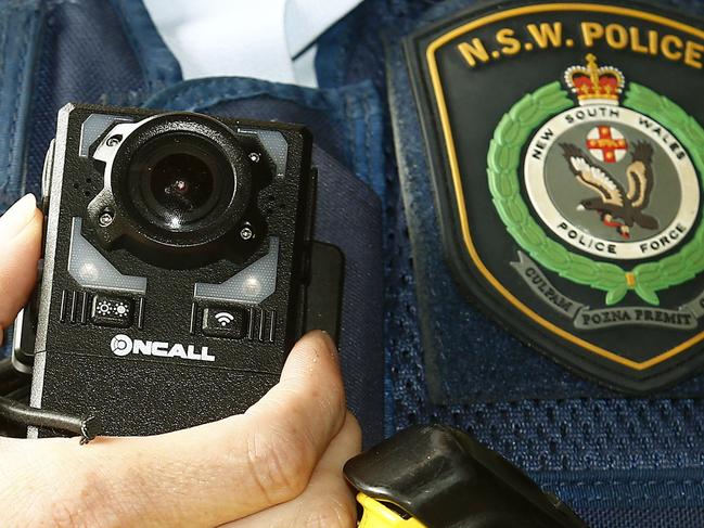 L to R: Leading Senior Constable Raquel Maitland  at Central Station wearing the Body worn video cameras. Police Transport Command officers will now carry  Body Worn Video, to allow them to record incidents or events where visual and audio evidence will support an investigation. Picture: John Appleyard