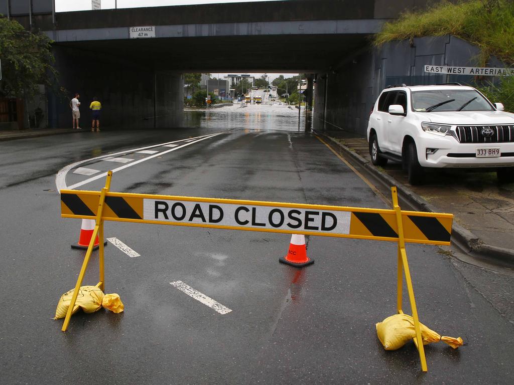 Whiddop Road was closed due to flooing in Toombul after heavy rain fell overnight in Brisbane. Picture: Tertius Pickard