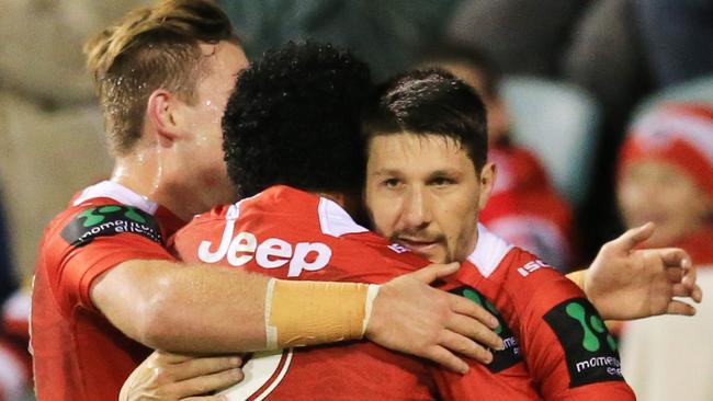 Dragons playmaker Gareth Widdop celebrates a try against the Storm. Pic Mark Evans