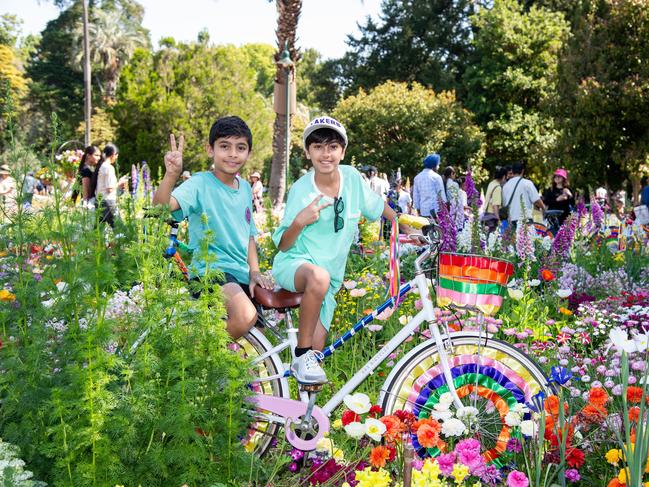 Kanav Dembra (left) and Viresh Jesrani in the Botanic Gardens, Queens Park during the Carnival of Flowers, Sunday September 22, 2024. Picture: Bev Lacey