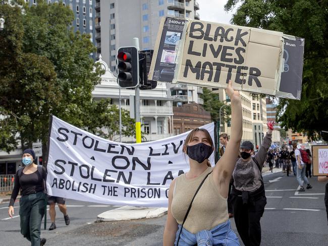 Protesters march through the Brisbane CBD after an indigenous woman died while being held in custody at the Brisbane watch house. Picture: NCA NewsWire / Sarah Marshall