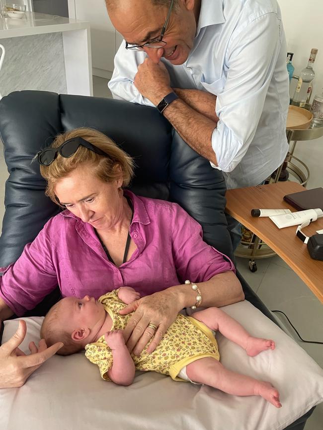 Jane with her granddaughter Hazel and husband Chris. Photo: Supplied