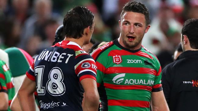 Sam Burgess exchanges words with Billy Smith.