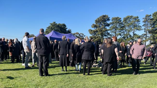 Family and friends gather for the burial of Gippsland local Nicholas Lowden after his sudden death. Picture: Jack Colantuono