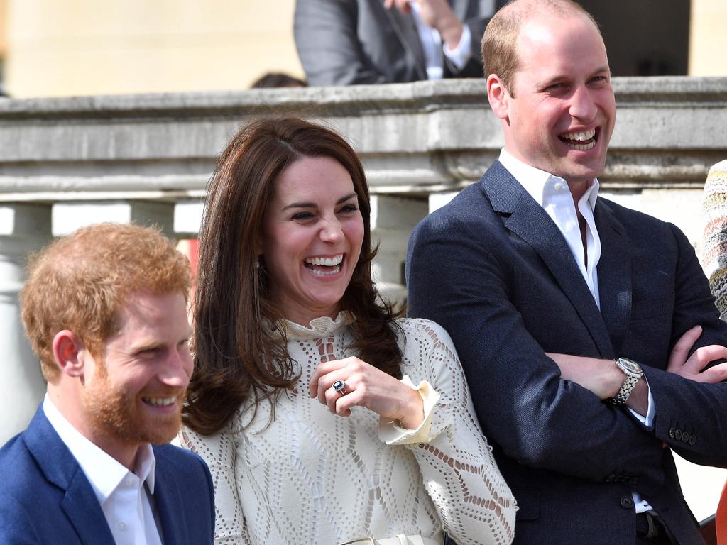 Before their relationship strained, Prince William, Prince Harry and Princess Catherine were often spotted having a laugh together. Picture: Getty Images