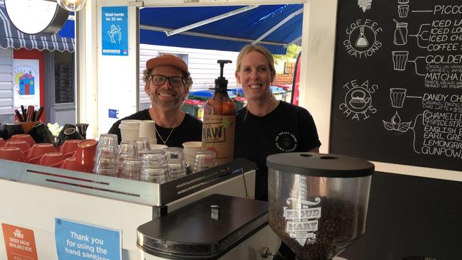 The owner of the Sneaky Grind cafe at Avalon Beach, Lauren Morris, with head barista Dan Harris, believe the NSW Government's Dine & Discover  COVID-19 economic stimulus program will boost business prospects. Picture: Jim O'Rourke