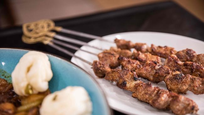 Uyghur Cuisine includes a big plate chilli chicken and lam skewers at Silkroad Uyghur Restaurant in Ashfield. Picture: Flavio Brancaleone