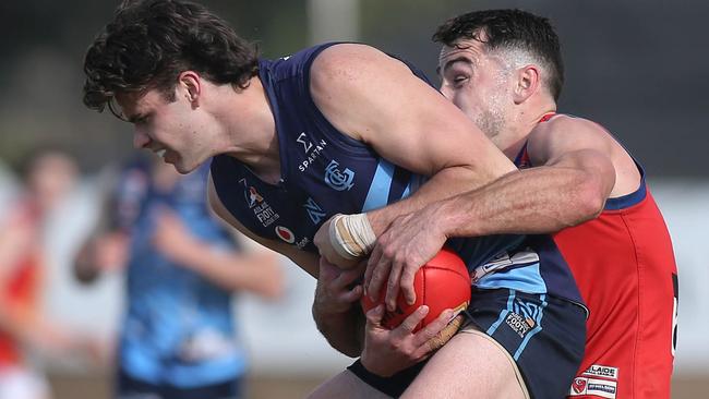 Glenunga’s Jack Scott is wrapped up by Old Ignatians’ Will Abbott in last year’s div two grand final. It was Glenunga who had the last laugh on Saturday. Picture: Dean Martin