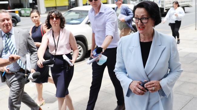 Former South Australian Deputy Premier Vickie Chapman flanked by reports after leaving a media conference Picture: NCA NewsWire / David Mariuz