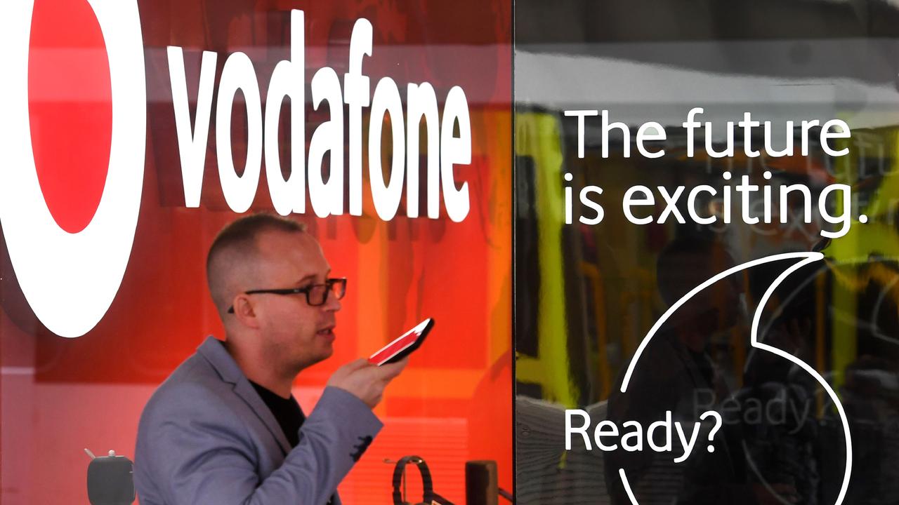 Vodafone mobile customers have been promised a better performing network as a result of the merger. William West / AFP