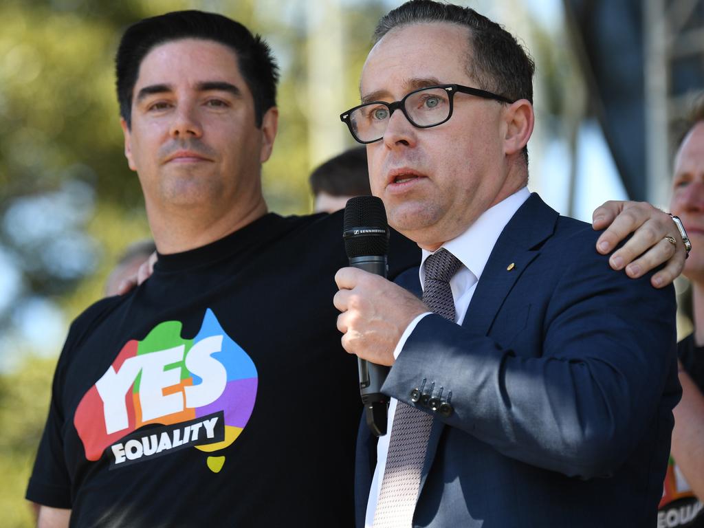 Joyce stands with Shane as he speaks after watching the same sex marriage vote result announcement on November 15, 2017.