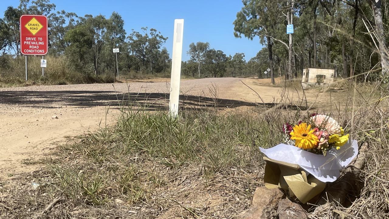 Flowers placed in tribute to three people killed in a shooting at Bogie on Thursday. Picture: Daniel Shirkie