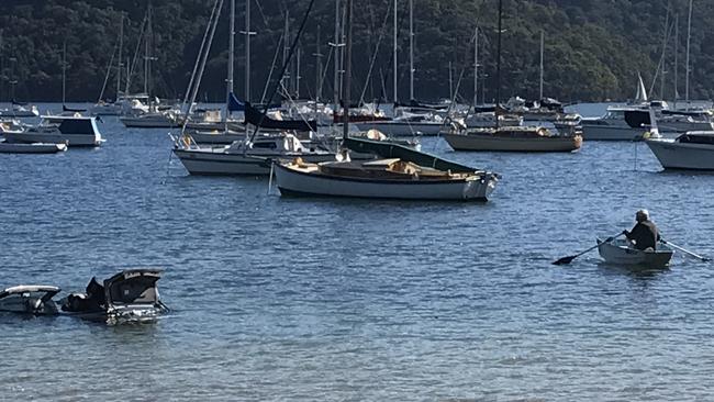 A stolen car was dumped in the water at Clareville.