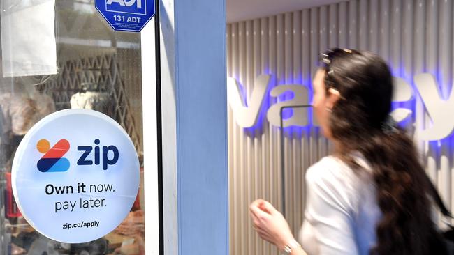 Buy now pay later Zip and Afterpay signs on shop fronts in Brisbane. Picture: John Gass/NCA NewsWire