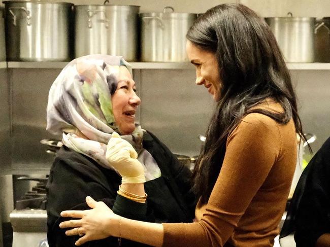 A photo released by Prince Harry of Meghan at The Hubb Community Kitchen, which was formed in the wake of the Grenfell Tower disaster. Picture: Instagram @sussexroyal