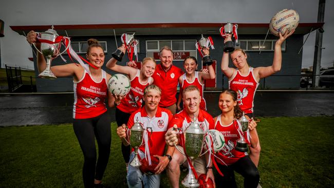 South Warrnambool premiership footy and netball players (back row) Annie Blackburn, Matilda Stevens, club president John Ross, Rosie Thornton, Saylah Veale and (front row) Stuart Brown, Harry Lee and Lottie McCosh. Picture: Nicole Cleary