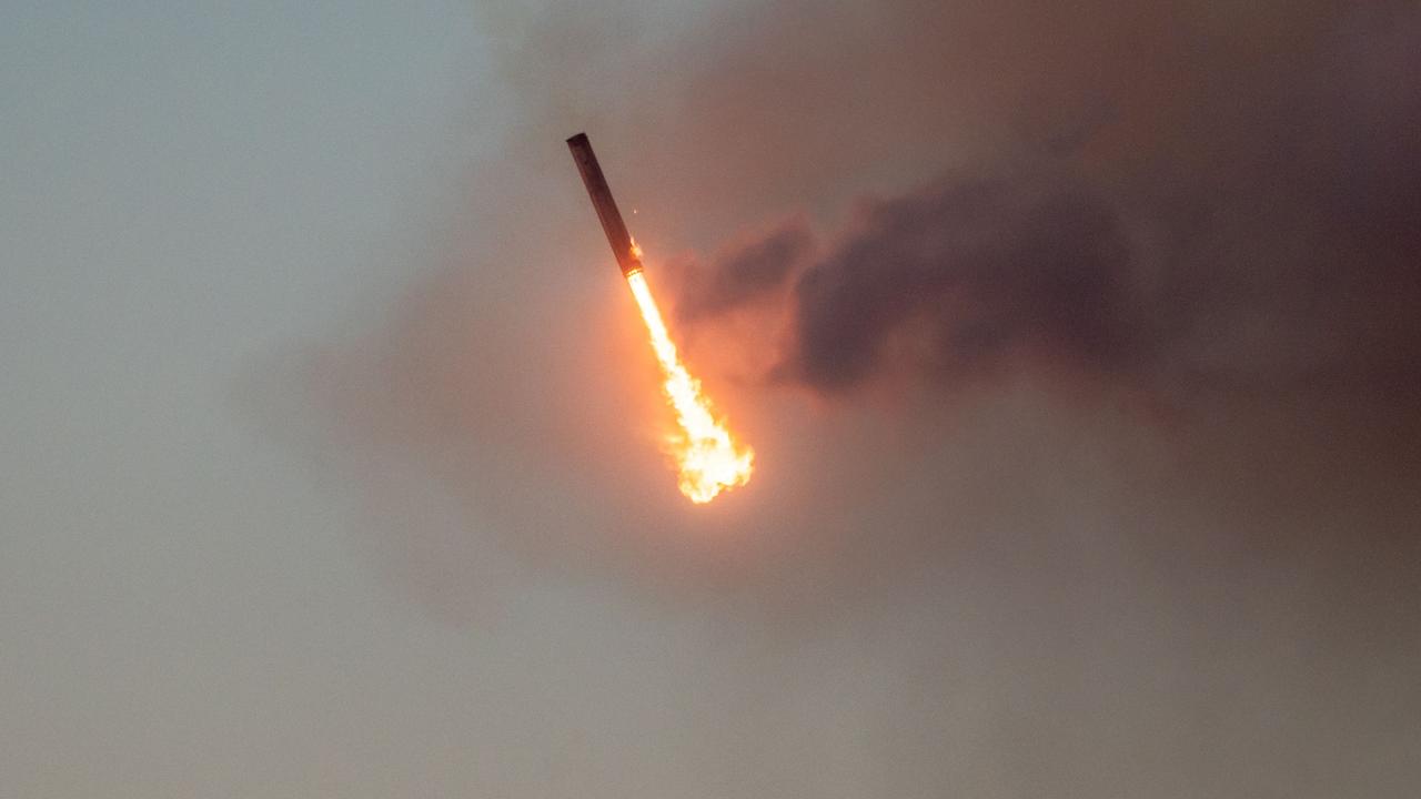 Starship's Super Heavy Booster comes in for a "landing" at the launch pad in Starbase near Boca Chica, Texas, on October 13, 2024. Picture: AFP.