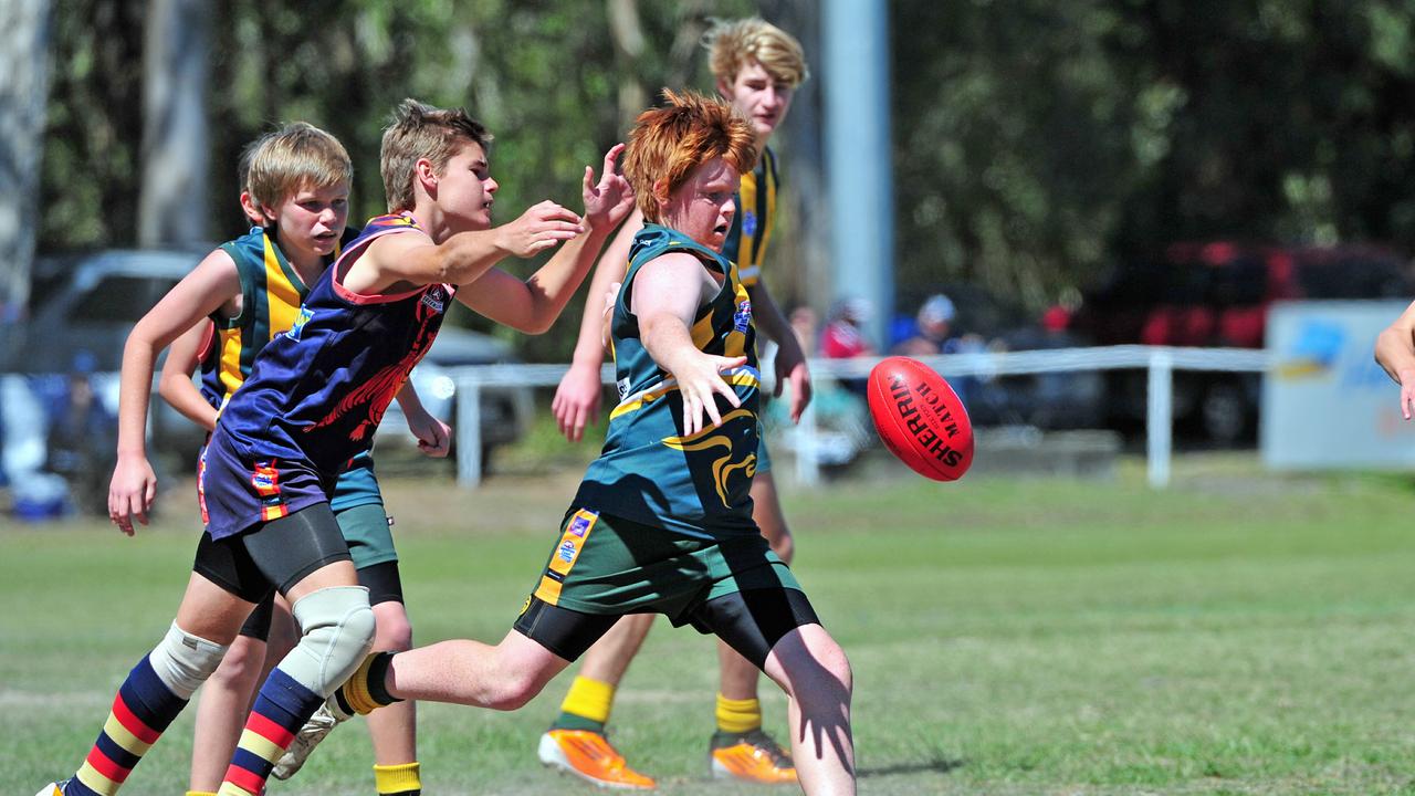 Noosa’s Jack Payne (left) attempts to tackle Zachary Neely in the Under 14 Division 1 Grand Final in 2012. Picture: Geoff Potter