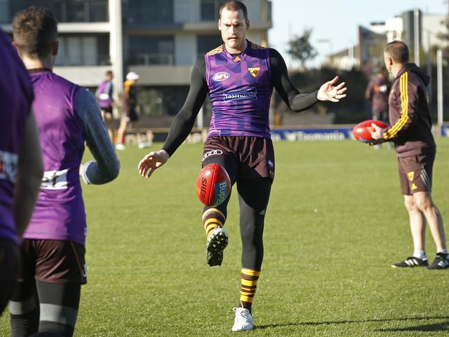 Jarryd Roughead joins Hawthorn teammates on the training track today. Picture: David Caird