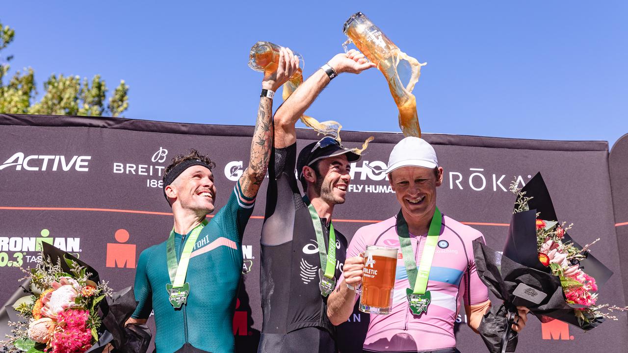 Ironman 70.3 Tasmania men’s podium. L-R 3rd Place, Caleb Noble, Winner Jake Birtwhistle and Mitch Kirby, 2nd place. Picture: Linda Higginson