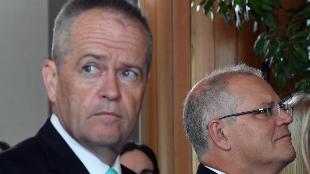 Leader of the Opposition Bill Shorten and Prime Minister Scott Morrison at an ovarian cancer event at Parliament House. Picture: AAP Image/Mick Tsikas