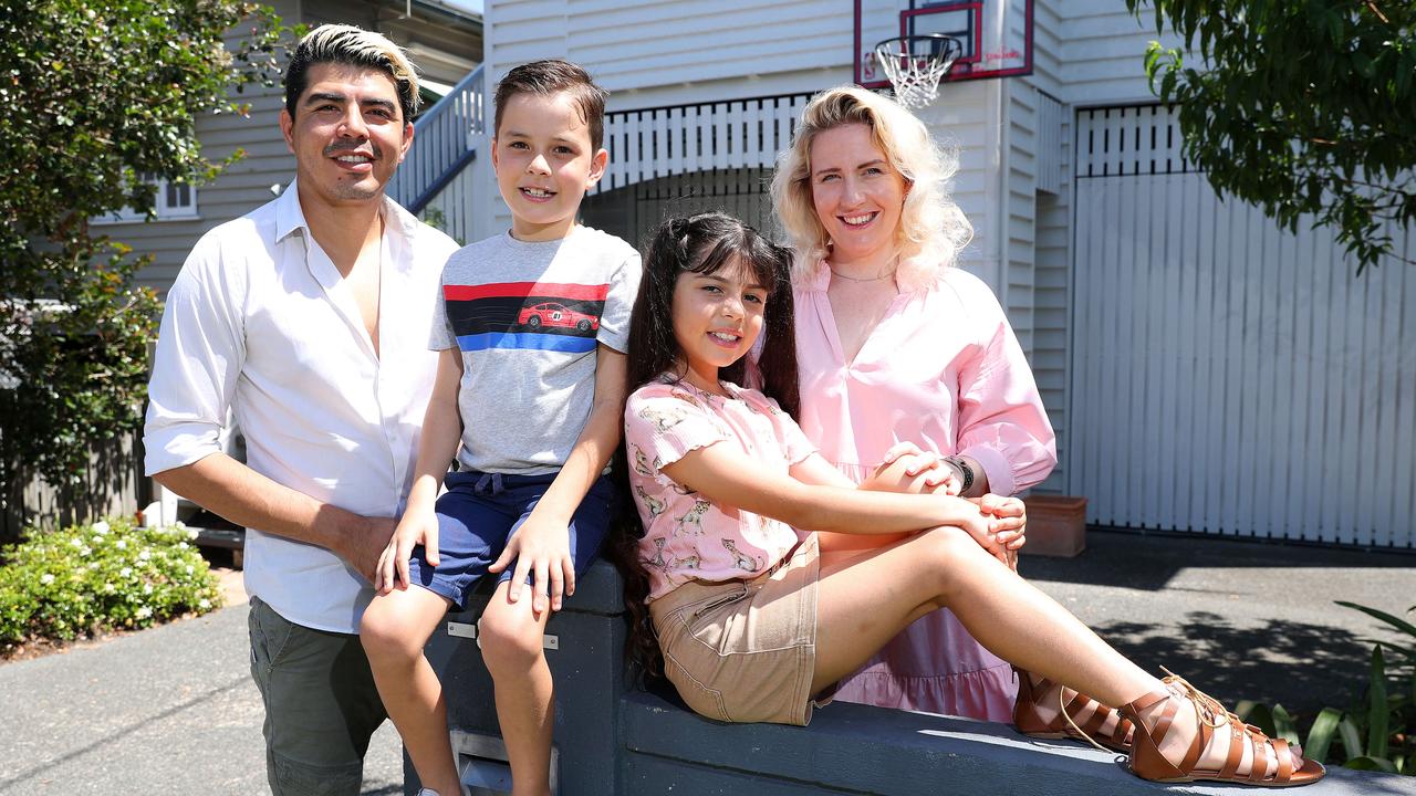 Josh and Krystal Lopez with their children Ezekiel (left) and Jemima together at home in Morningside. Picture: Liam Kidston