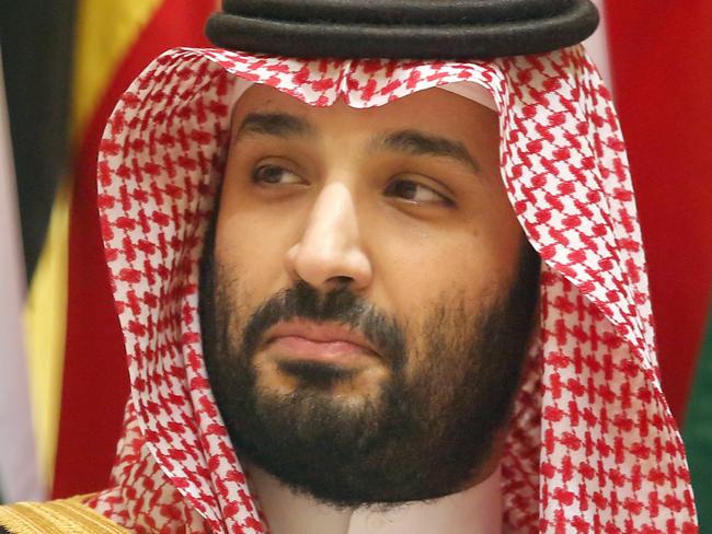 Saudi Crown Prince Mohammed bin Salman poses during a group picture ahead of Islamic Summit of the Organization of Islamic Cooperation (OIC) in Mecca, Saudi Arabia, early Saturday, June 1, 2019. Muslim leaders from some 57 nations gathered in Islam's holiest city of Mecca late Friday to discuss a breadth of critical issues ranging from a spike in tensions in the Persian Gulf, to Palestinian statehood, the plight of Rohingya refugees and the growing threat of Islamophobia. (AP Photo/Amr Nabil)